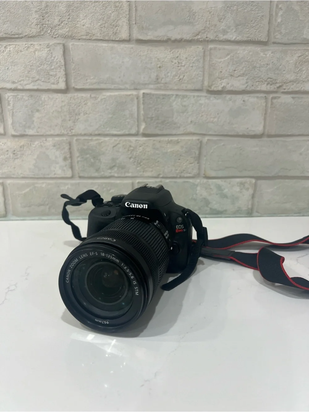 Canon EOS Rebel SL1 DSLR Camera + 18-135mm Lens, Battery, Charger & Memory Card
